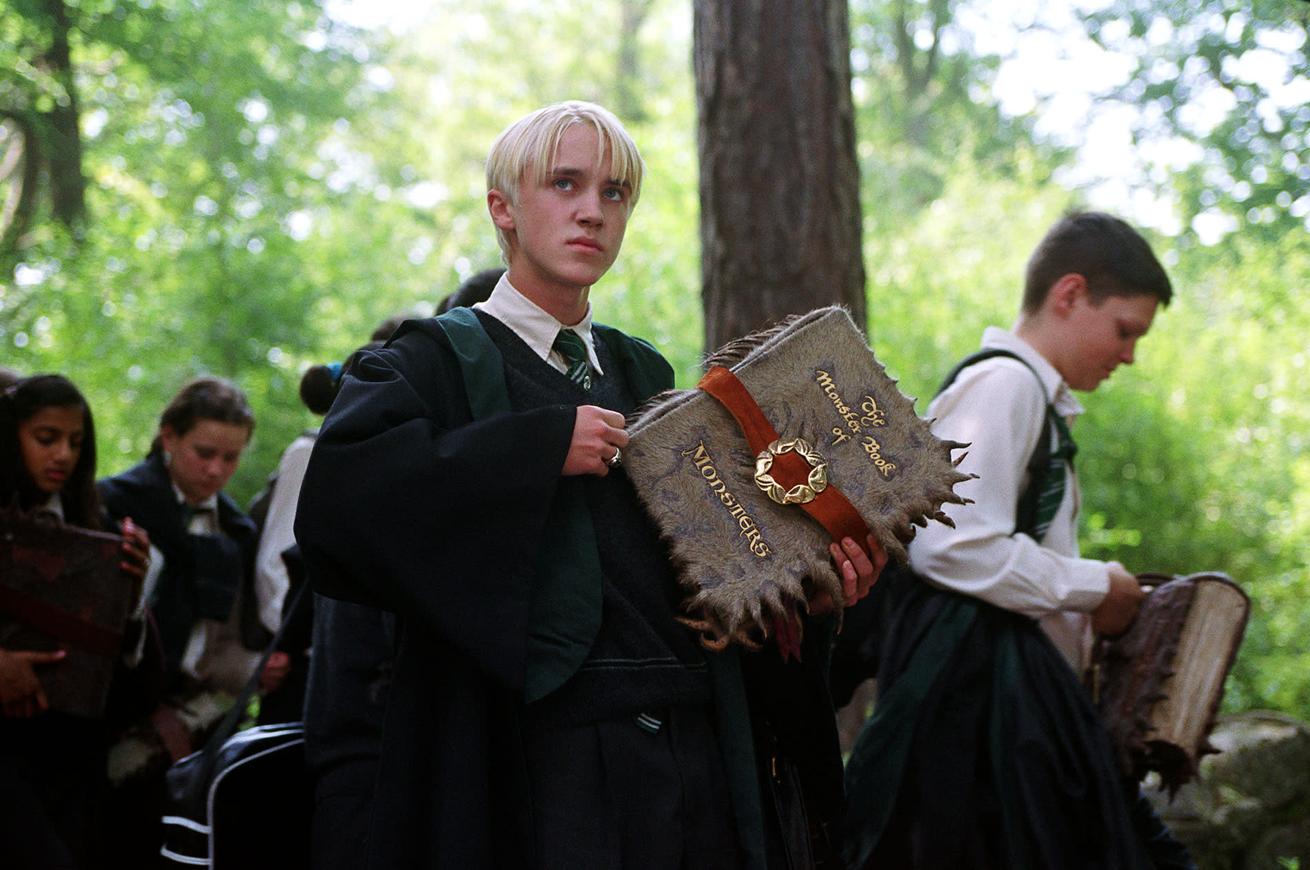 WB-F3-draco-in-care-of-magical-creatures-with-monster-book-of-monsters-web-landscape